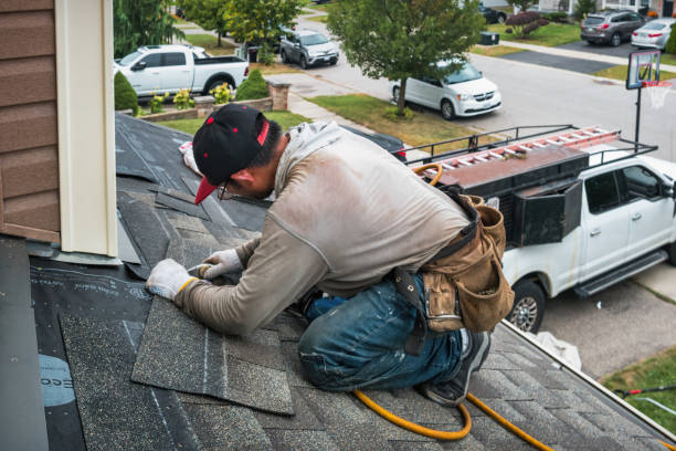 Professional Roofing technician working in Linwood, NY